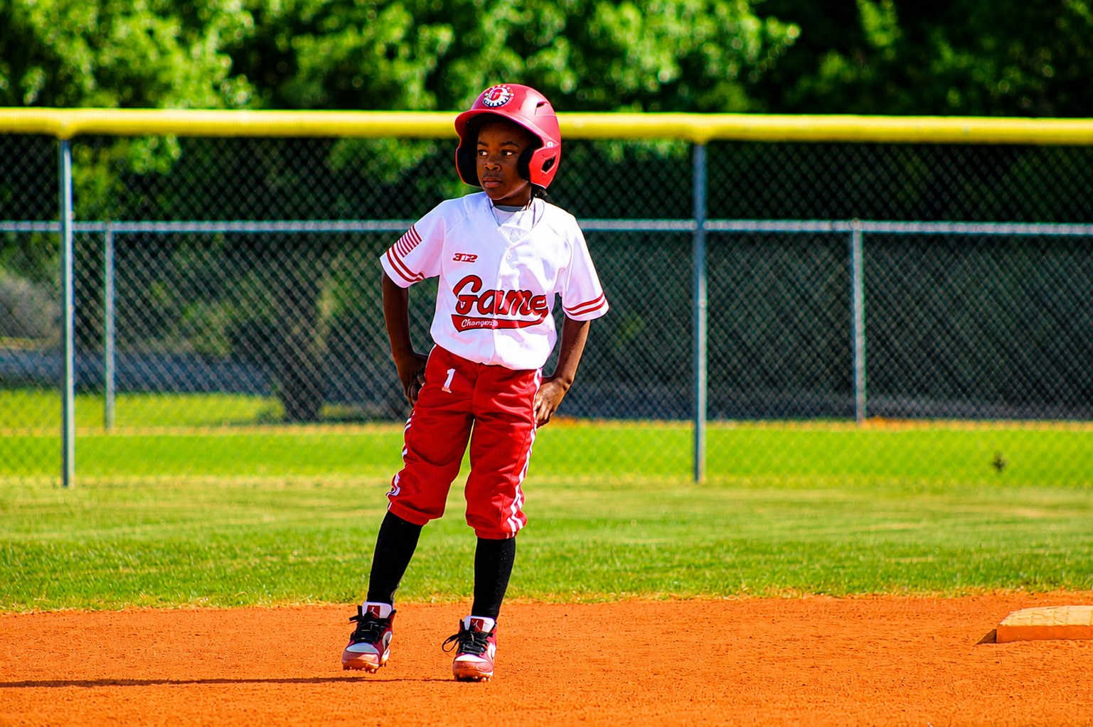 Game Changers youth player on base